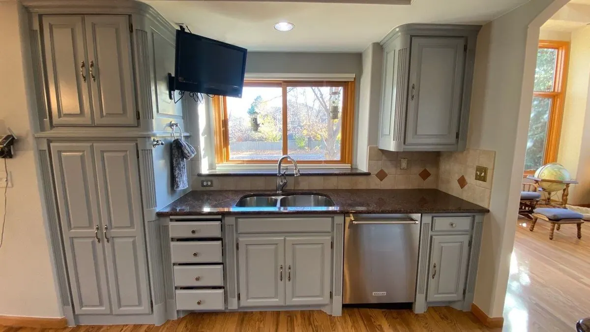 Repainted gray kitchen cabinets in a Denver home